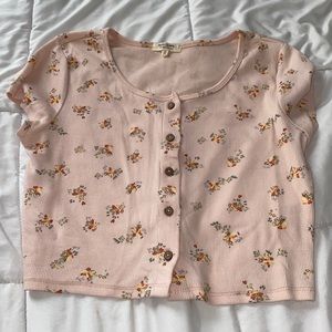 light pink crop top buttons, beautiful flowers.